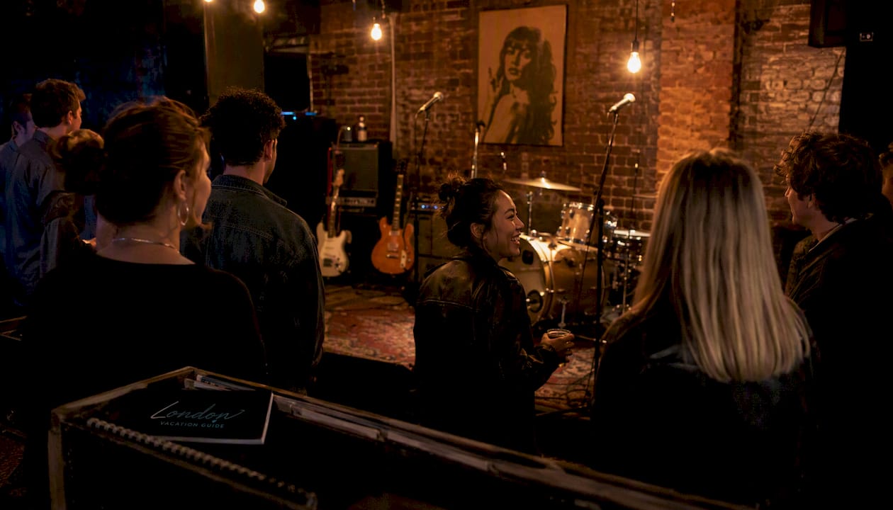 Interior of 100 Club with audience and stage